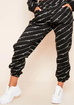 Eliora Black Repetitive Slogan Joggers^Missy Empire Flash Sale